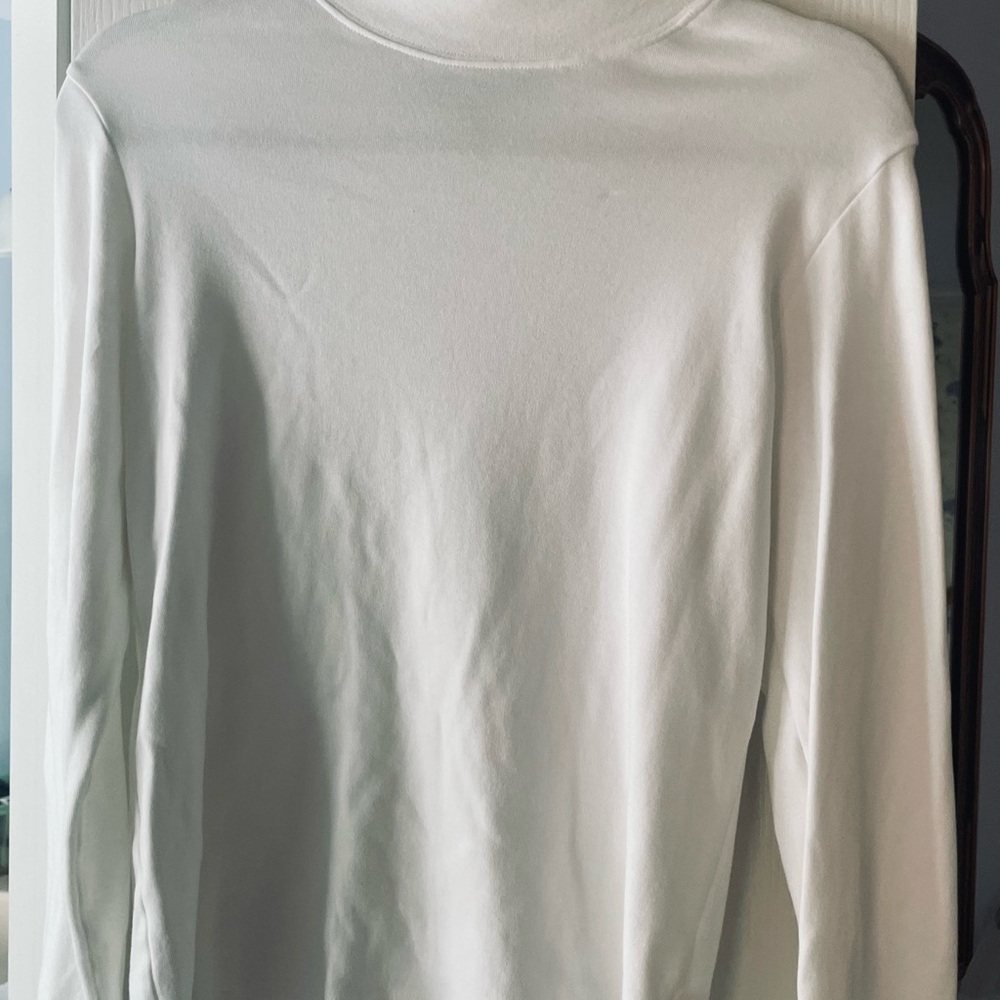 Turtleneck. White long sleeve. Small-like new. From pet free & smoke free home.